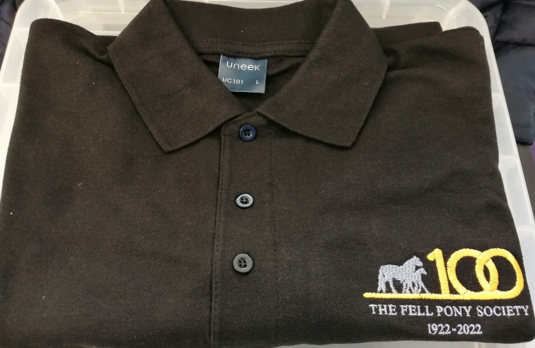 Black polo shirts with 100 logo in gold