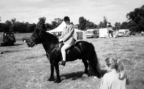 Mrs. Lisa Dunger on Salisbury Monty at the Wayland Agricultural show in Norfolk August 1998, fourth, in the ridden Mountain and Moorland class having behaved himself impeccably!